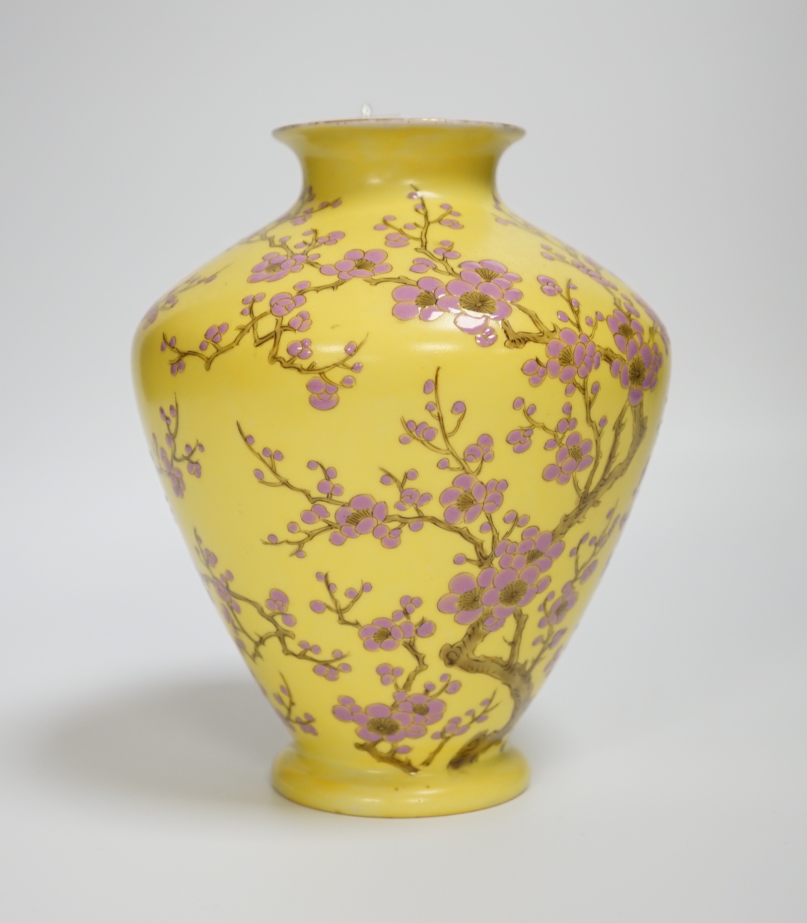 A Japanese yellow ground vase with pink cherry blossom design, 16cm